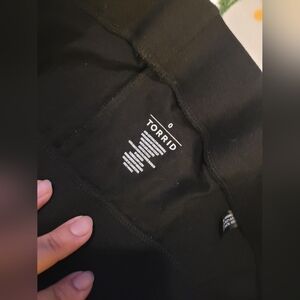 Size 0 Torrid black leggings with sheer knees (pics attached) never used